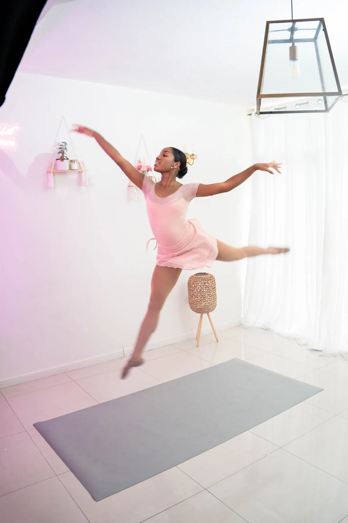 Dr. Sherona McAllister dancing in her studio