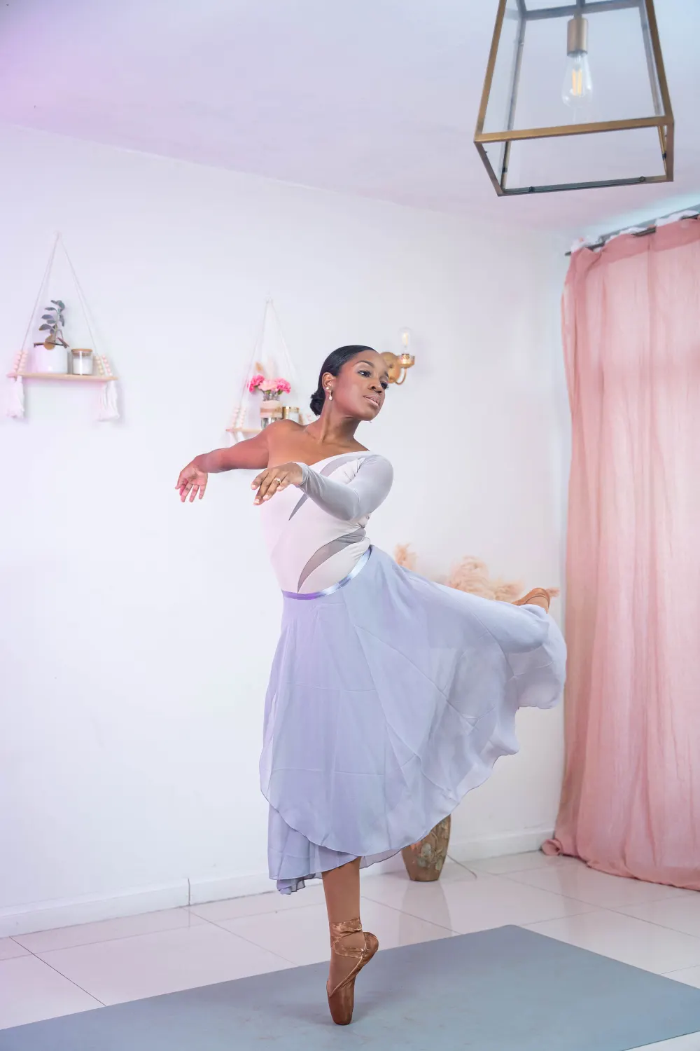 Dr. Sherona McAllister smiling in the Ballet Bloom studio